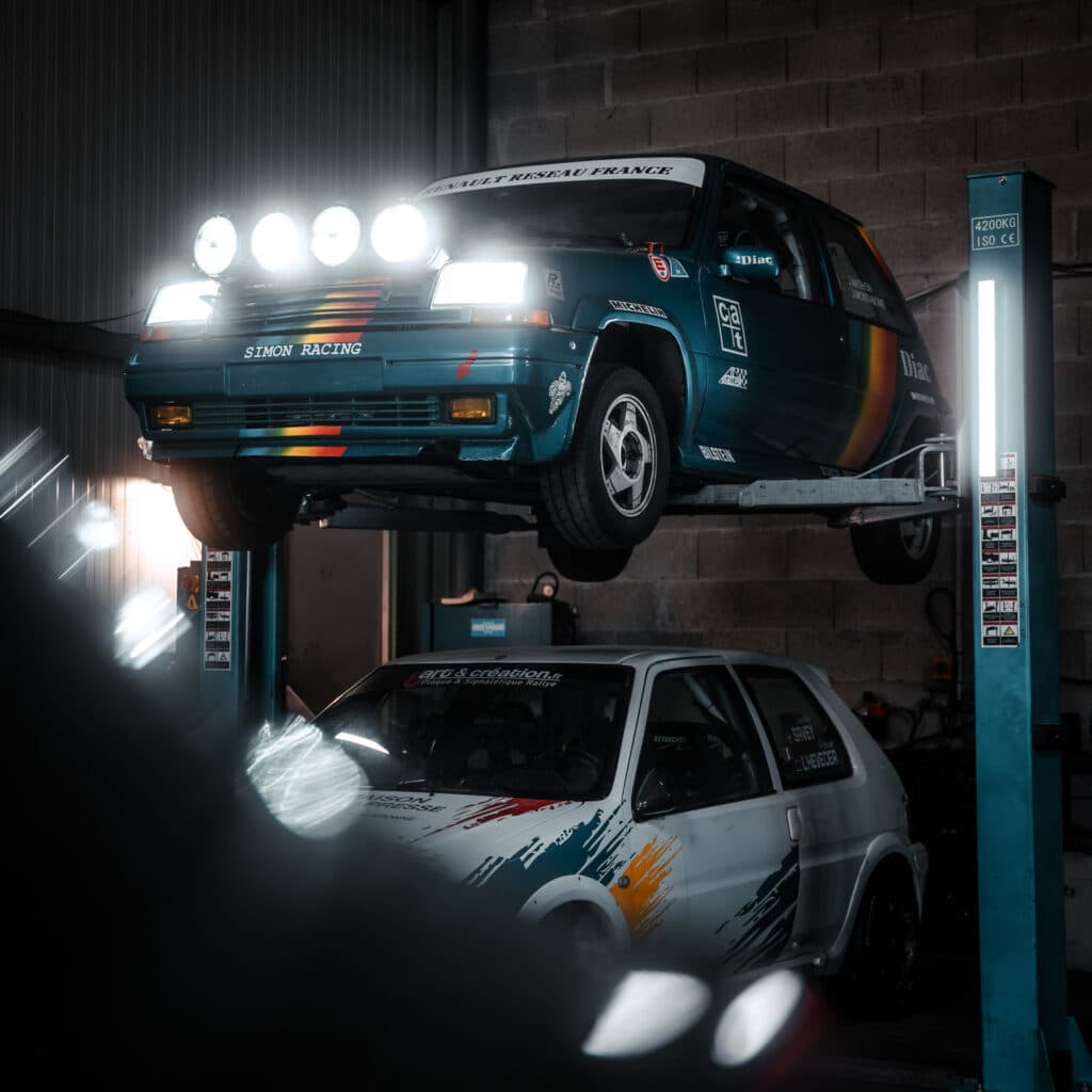 Brand photography Luxembourg: rally cars in garage motorsport campaign