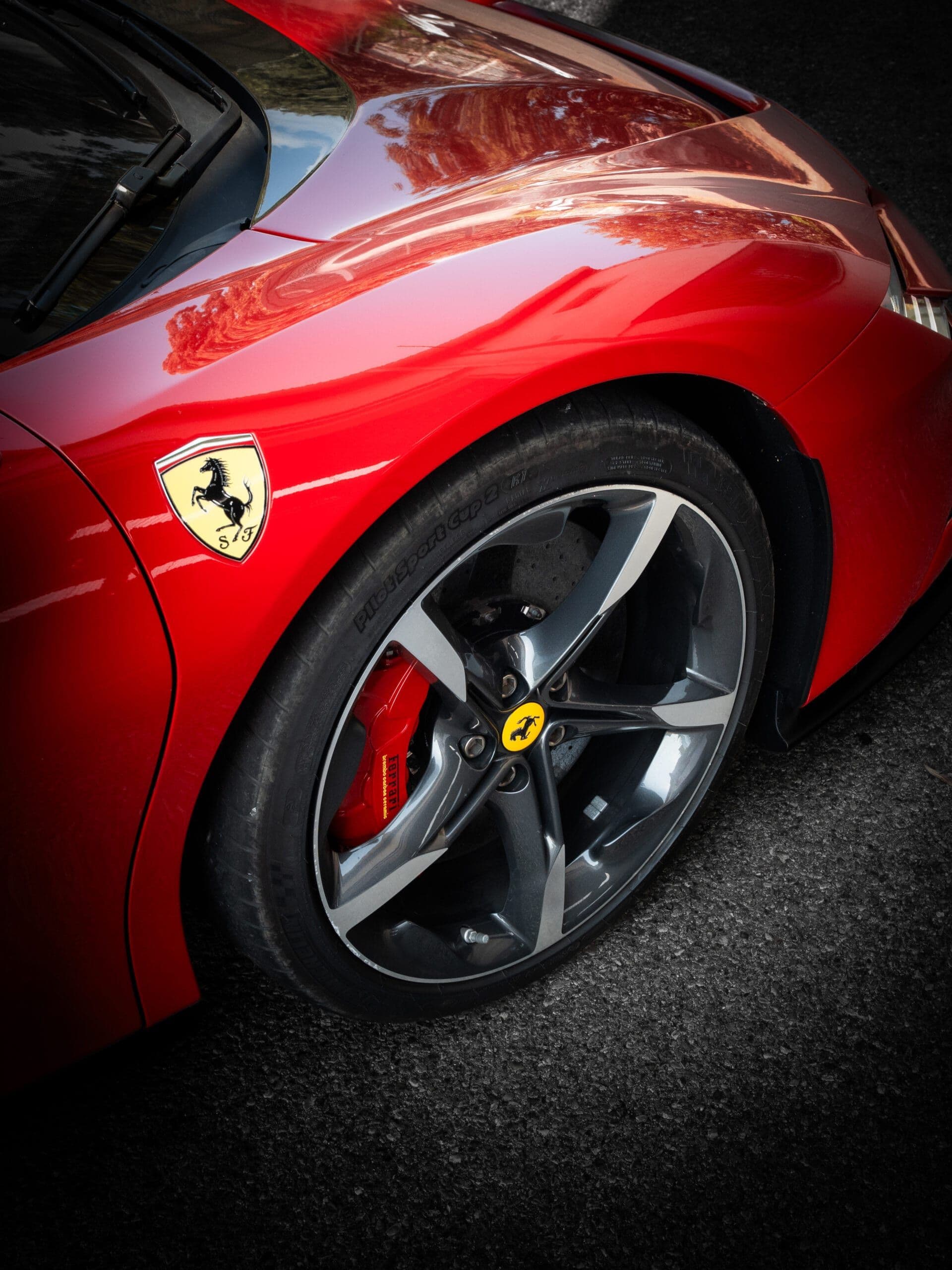 Brand photography Luxembourg: Ferrari wheel brake caliper detail automotive