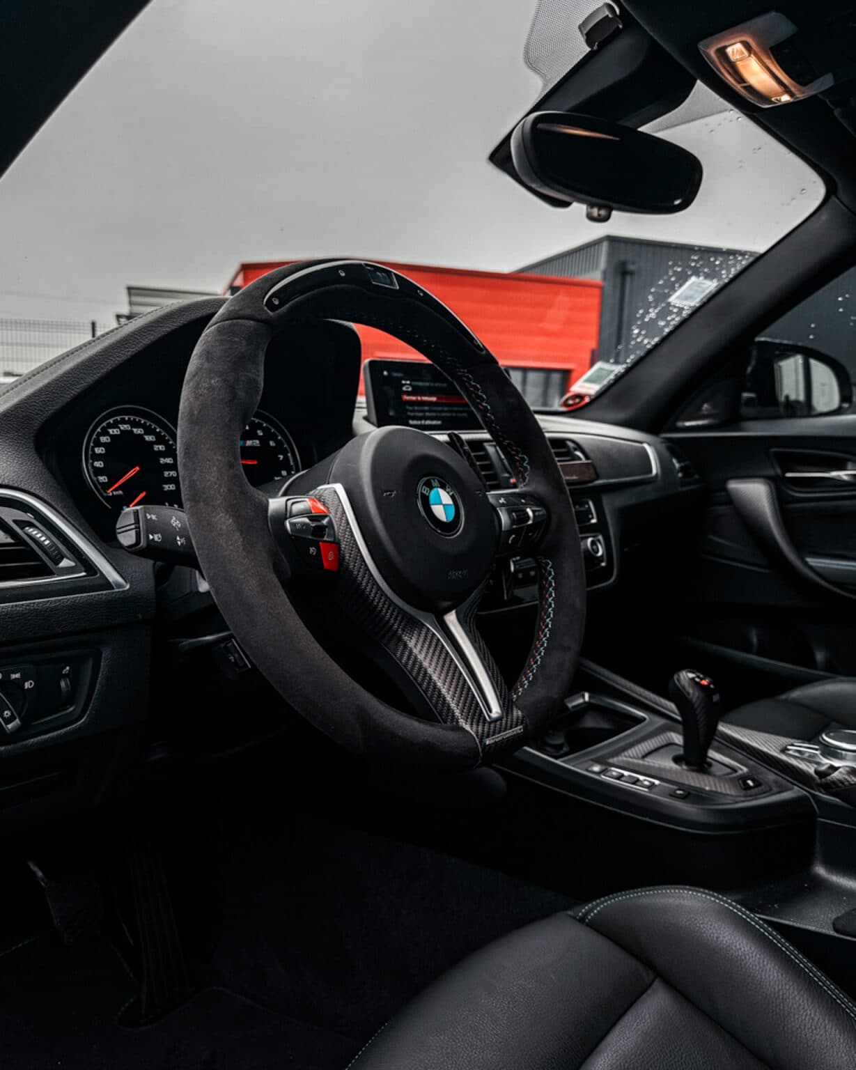 Brand photography Luxembourg: BMW M sport steering wheel interior detail