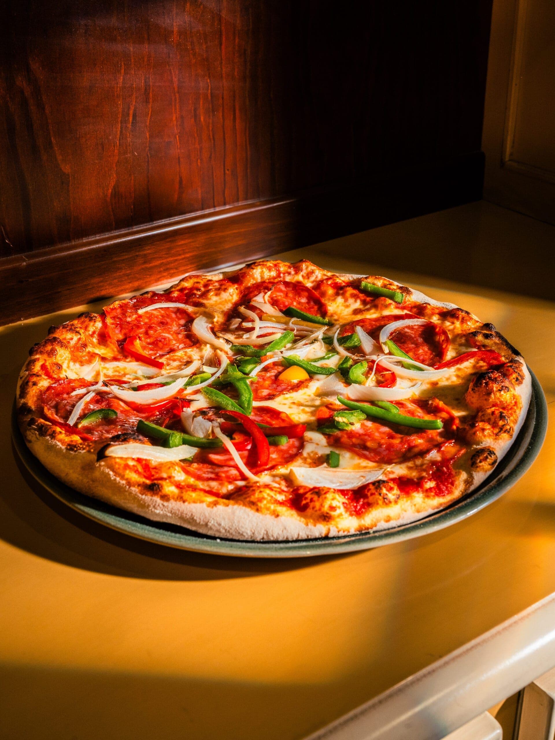 Food photography Luxembourg: pizza baked in wood-fired oven restaurant