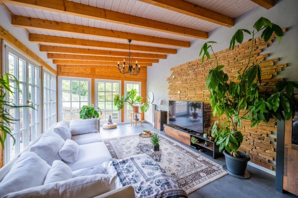 Real estate photography Luxembourg: HDR living room wooden beams stone wall