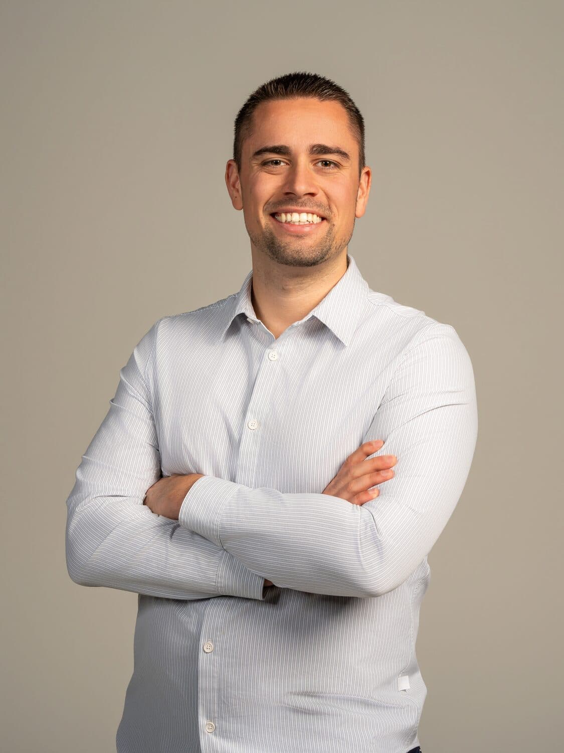 Chris Stambolidis, founder of Career Solutions Group — relaxed portrait, open collar