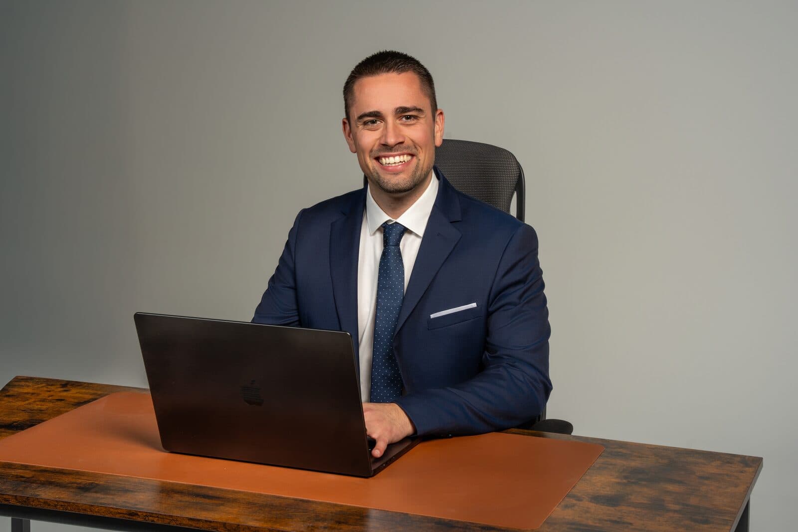 Chris Stambolidis, founder of Career Solutions Group — at the desk, working