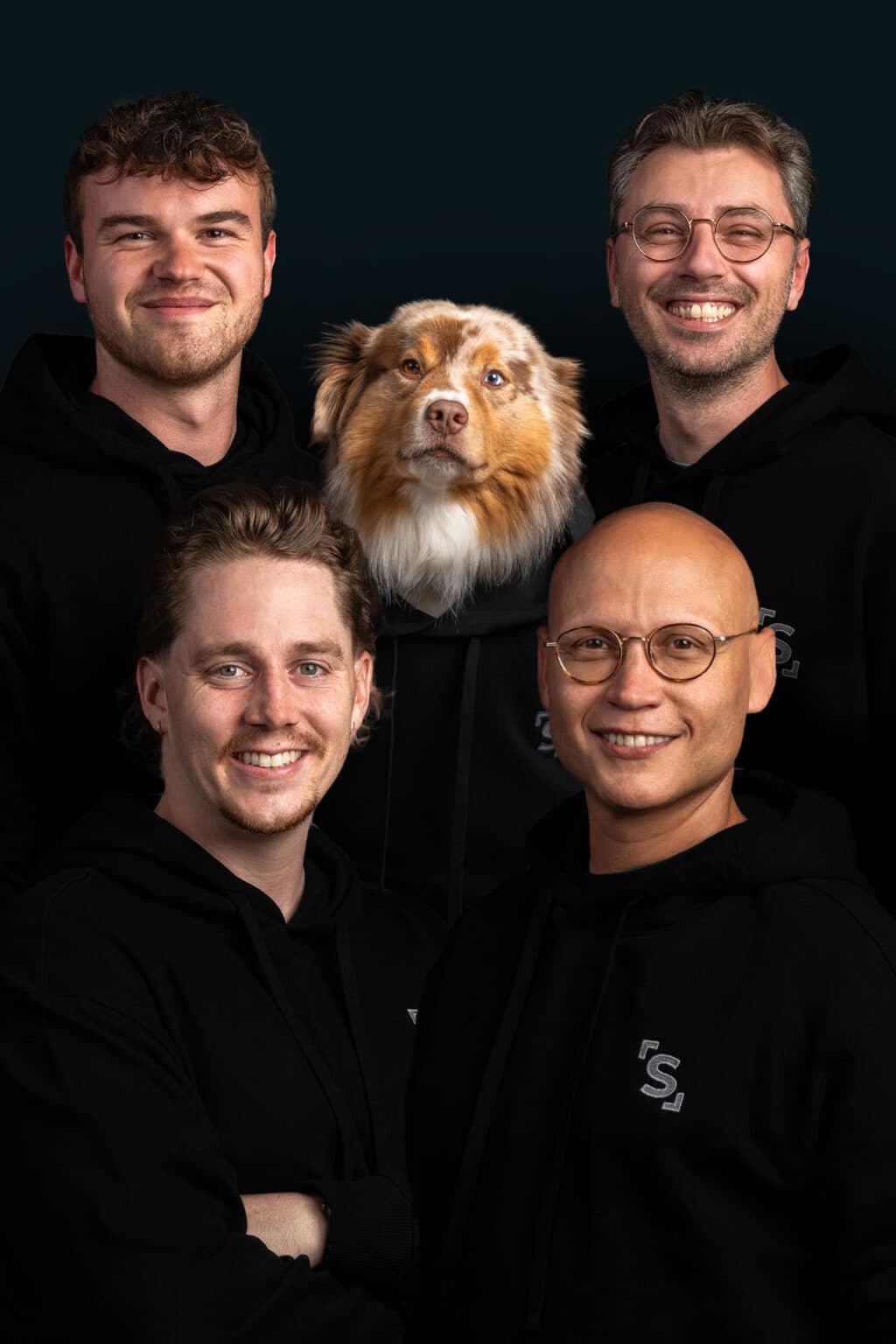 Studio team portrait shot in Luxembourg, four people on a black background