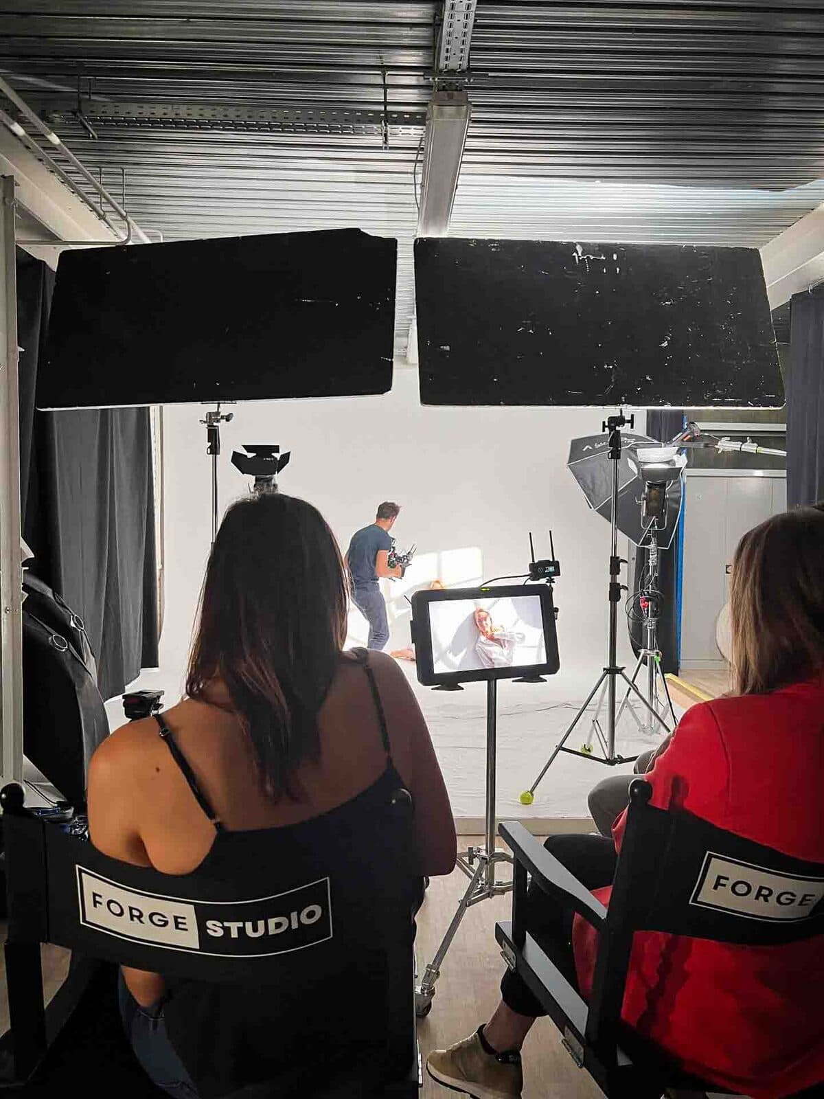 Watching the take on set in the studio